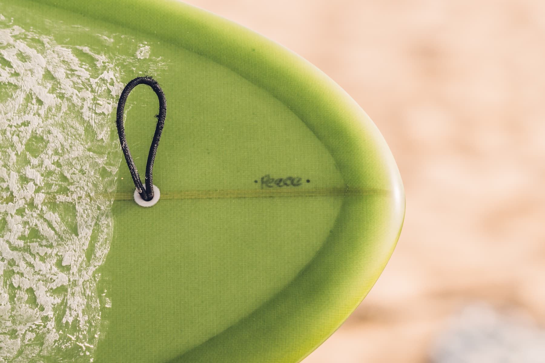 Closeup eines grünen Surfboards